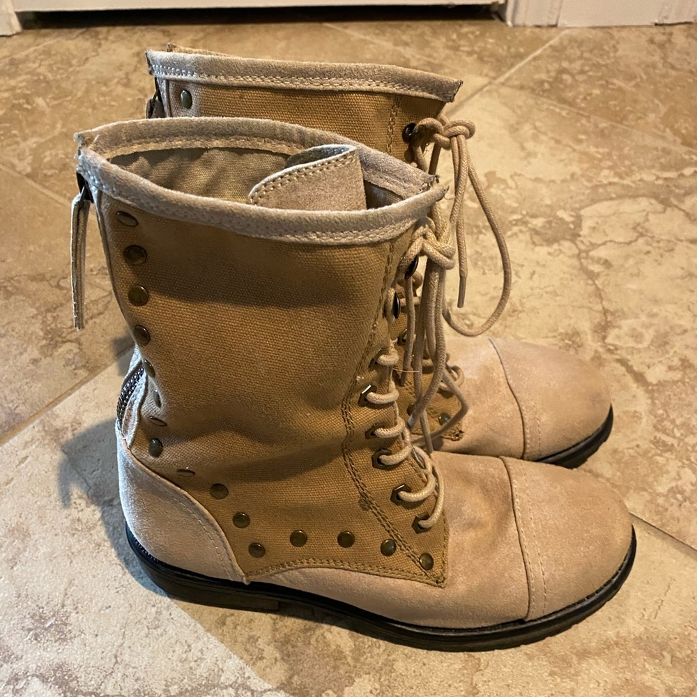 Roxy boots, lace up with zippers in back.